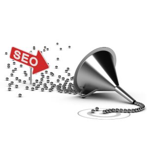 image show a funnel fed with ball bearings this depict customers getting funnelled by seo to your website